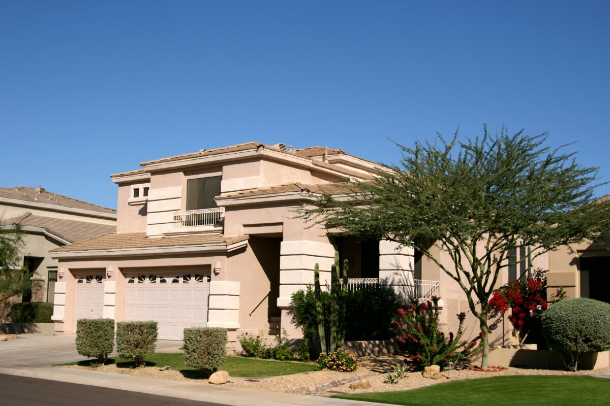 Phoenix home with desert landscaping and gravel beds in the fall